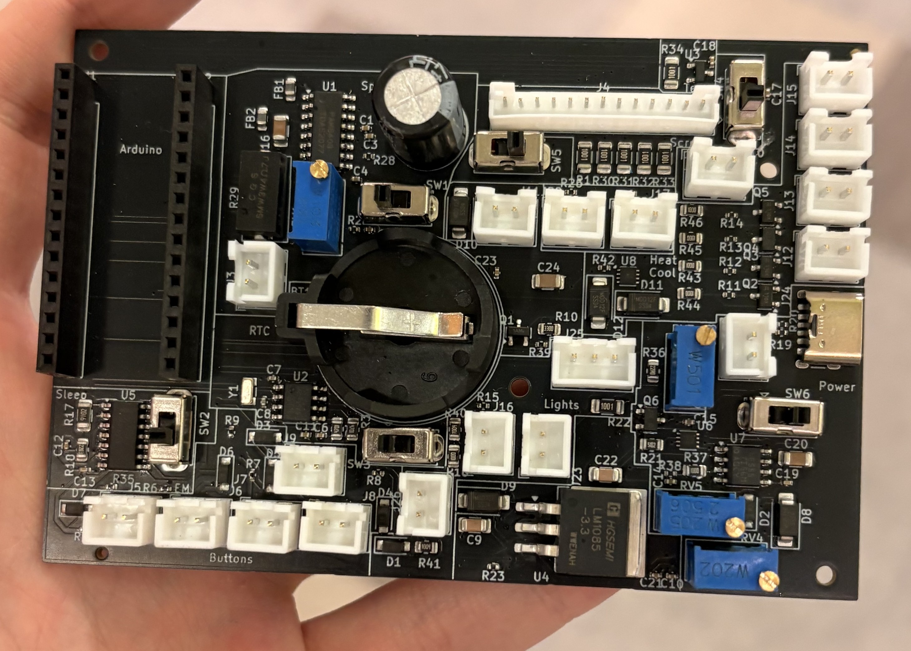 Custom PCB: RTC, power regulation, MOSFET drive stages, and I/O connectors.